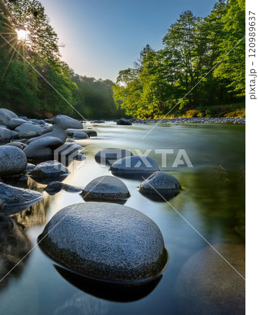 Zen Stones by a Calm River 120989637