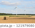 Windmills near the field of flax Normandy France 121979080