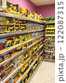 Wide selection of toys in children's store. Inside toy shop of model cars 122087315