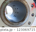 Internal view of an ultrasonic flow meter showing sensor mounting holes 123069715