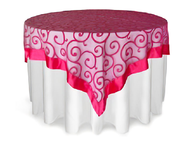 white linen with a pink overlay on a table on a white background.