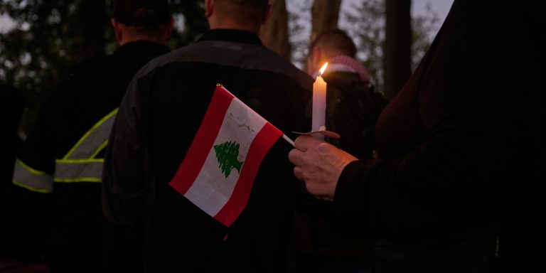 Members of the Middle Eastern community living in Dearborn, MI hold a candlelight vigil on the anniversary October 7 terrorist attacks in Israel, Saturday, Oct. 7, 2024. (Photo by Dominic Gwinn / Middle East Images / Middle East Images via AFP) (Photo by DOMINIC GWINN/Middle East Images/AFP via Getty Images)