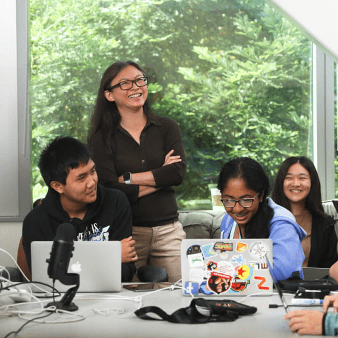 Professor Sri Kurniawan with students, all smiling