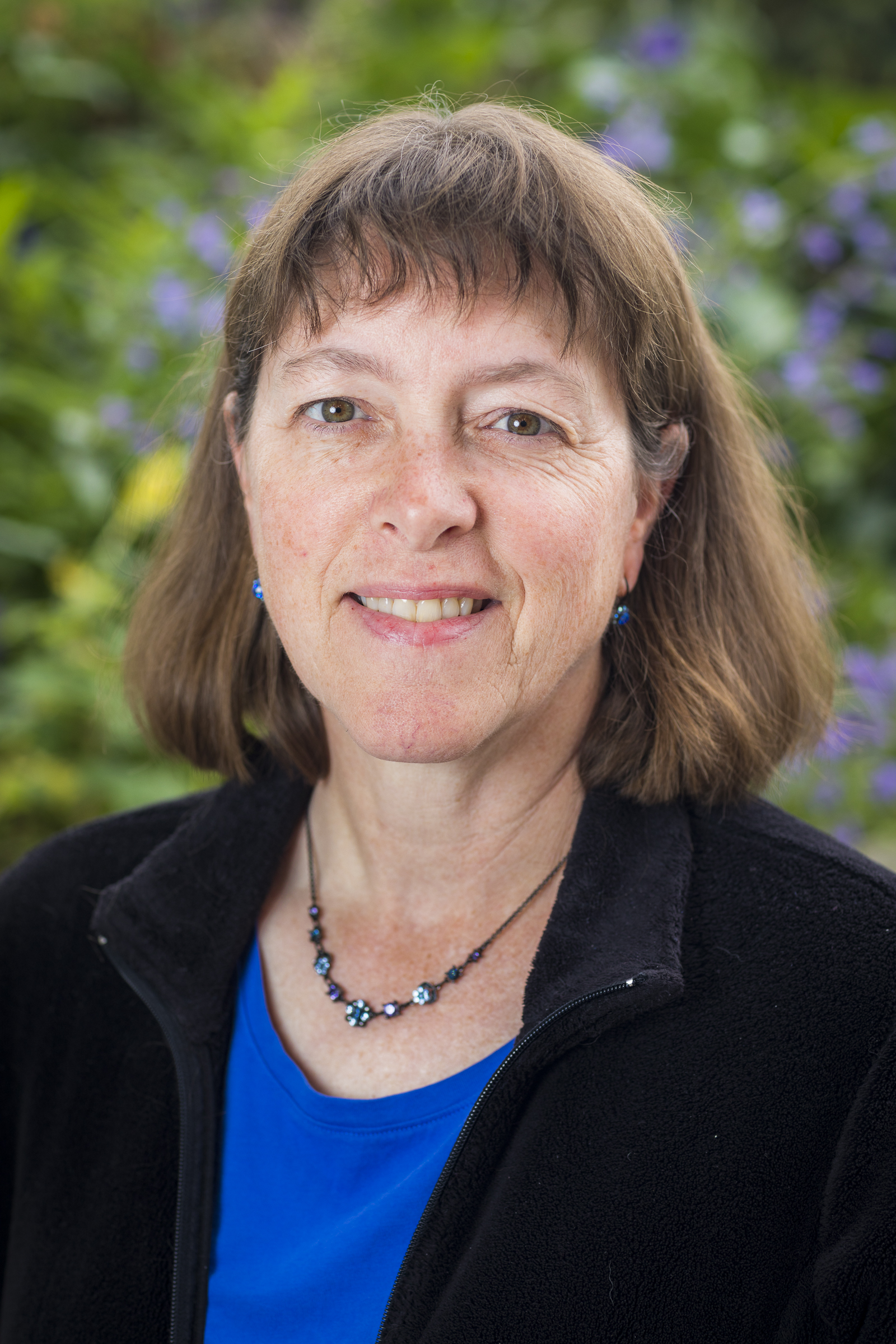 Karen Jensen, the UAF director of libraries, outside on the Troth Yeddha' campus in Fairbanks, Alaska.