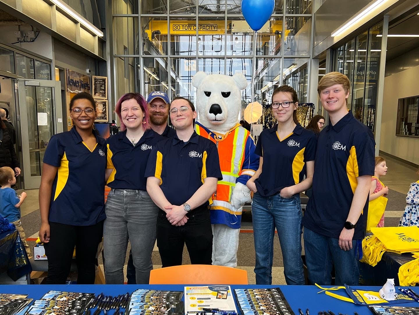 Tau Beta Pi students welcome visitors to the engineering open house in late February.