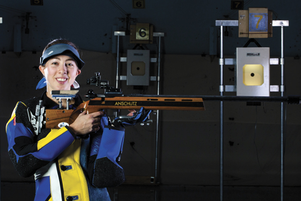 woman holding rifle