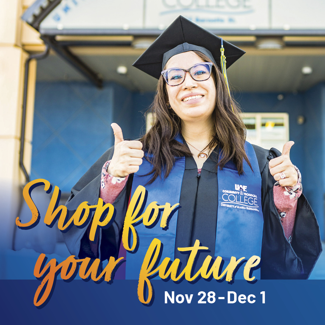 UAF Community and Technical College student wearing her cap and gown while standing in front of the CTC building. The words 