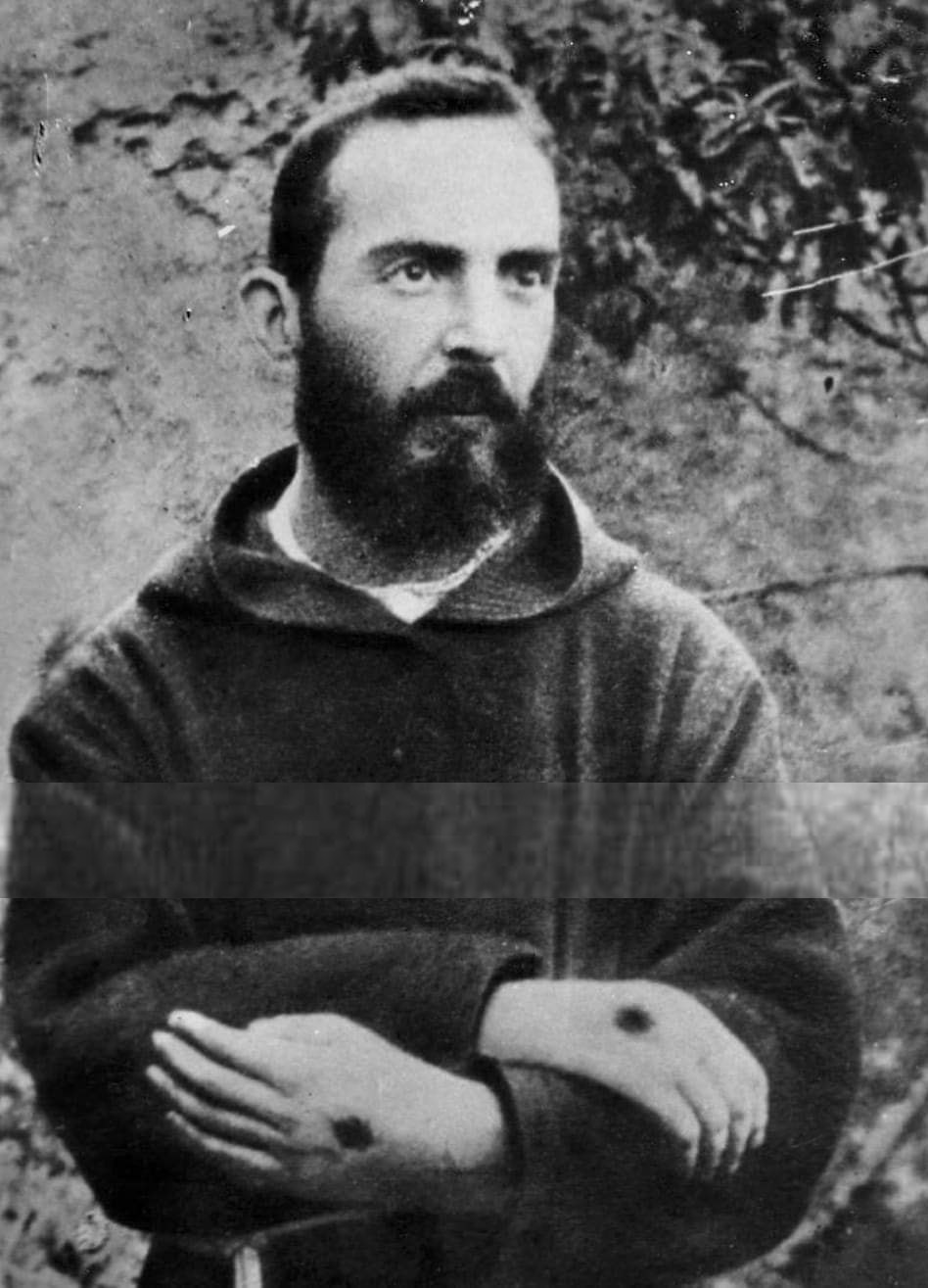 A young Padre Pio showing the stigmata