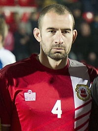 Danny Higginbotham met Gibraltar, 2014