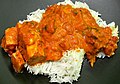 Image 24Chicken tikka masala, served atop rice. An Anglo-Indian meal, it is among the UK's most popular dishes. (from Culture of the United Kingdom)