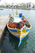 A Luzzu in Marsaskala Harbour.jpg