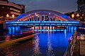 "Boat_passing_under_Elgin_Bridge_during_blue_hour_(2023)-L1003785.jpg" by User:Frank Schulenburg