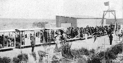 Tokio station, where passengers boarded the train to Ostende, Argentina (1913) observation car (Decauville wagon)