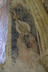 Painting of a woman with a dove on her head.