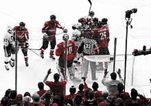 Photographs of an on-ice altercation between the Penguins and the Washington Capitals