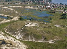 DEMATHÉ, Alexandro. Entre sambaquis, redes e naufrágios: arqueologia costeira no Parque Arqueológico do Sul – SC. 2014. 244 f. Dissertação (Mestrado em Preservação do Patrimônio Cultural) - IPHAN, Rio de Janeiro, 2014.