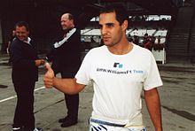 Photograph of a young South American man giving a thumbs-up signal