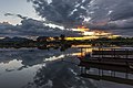 2 Water reflection of sunset with gray and orange clouds and pirogues moored to the bank in Don Det Laos uploaded by Basile Morin, nominated by Basile Morin,  16,  0,  0