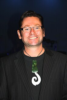 A man in his 40s wearing a Pounamu pendant