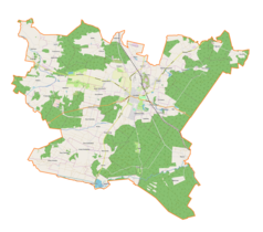 Mapa konturowa gminy Końskie, blisko centrum po lewej na dole znajduje się punkt z opisem „Nowy Dziebałtów”