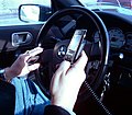 Image 5A New York City driver holding two phones (from Smartphone)
