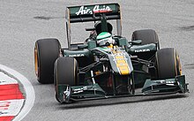 Photographie d'Heikki Kovalainen dans le cockpit de sa monoplace