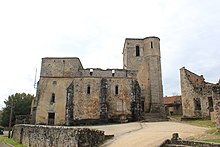 Photographie en couleurs des ruines de l'églse