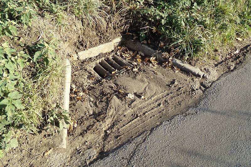 File:Drain on Kerdiston Road - geograph.org.uk - 5212515.jpg