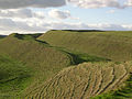 Image 29View of the ramparts of the hillfort of Maiden Castle (450 BC), as they look today (from History of England)