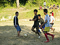 Boys playing football in Manipur.[relevant?]