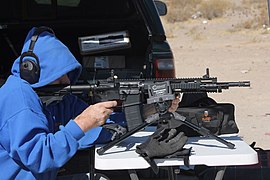 Man Firing ABC-15 While Sitting.jpg