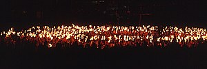 5 – The Circle Round the Galley. When all the torchbearers arrive at the final resting spot of the longship, they form a circle round it and sing the traditional Up Helly Aa song.