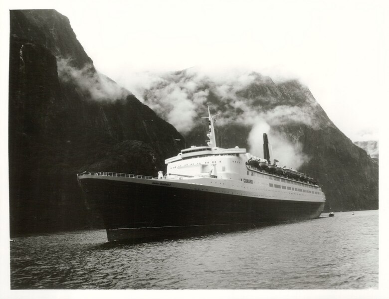 File:Southland Cunard Line's Queen Elizabeth 2, arriving and departing Milford Sound in the rain (32602465092).jpg