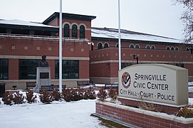 The Springville, Utah Civic Center building with Dallin Pioneer Mother Memorial. The Dallin sculpture was moved from its nearby park site when the new Civic Center Building was erected.