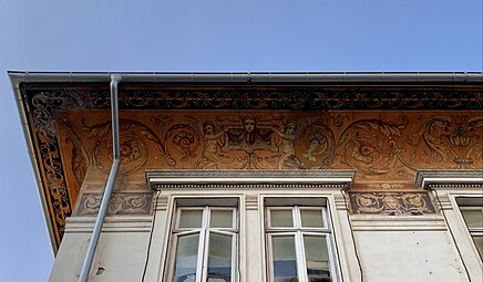 Renaissance Revival grotesque with putti on the Doctor Răuțoiu House (Strada Tache Ionescu no. 29), Bucharest, designed by Gregoire Marc and Ernest Doneaud, c. 1910[19]