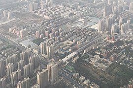 Vue partielle du centre[127] de la petite ville de Longhu, , Xinzheng city (ville-district ), Zhengzhou municipality (ville-préfecture), Henan. 2019