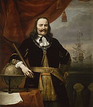 Ferdinand Bol (portrait) and Willem van de Velde (II) (marine). Portrait of Michiel Adriaensz. de Ruyter (1607-1676) . 1667. oil on canvas medium QS:P186,Q296955;P186,Q12321255,P518,Q861259 . 150 × 127 cm (59 × 50 in). London, National Maritime Museum.