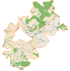 Mapa konturowa gminy wiejskiej Oleśnica, u góry znajduje się punkt z opisem „Pałac w Brzezince”