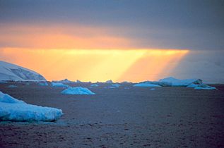 Crepuscular rays illuminate half the sky - Antarctic sunset