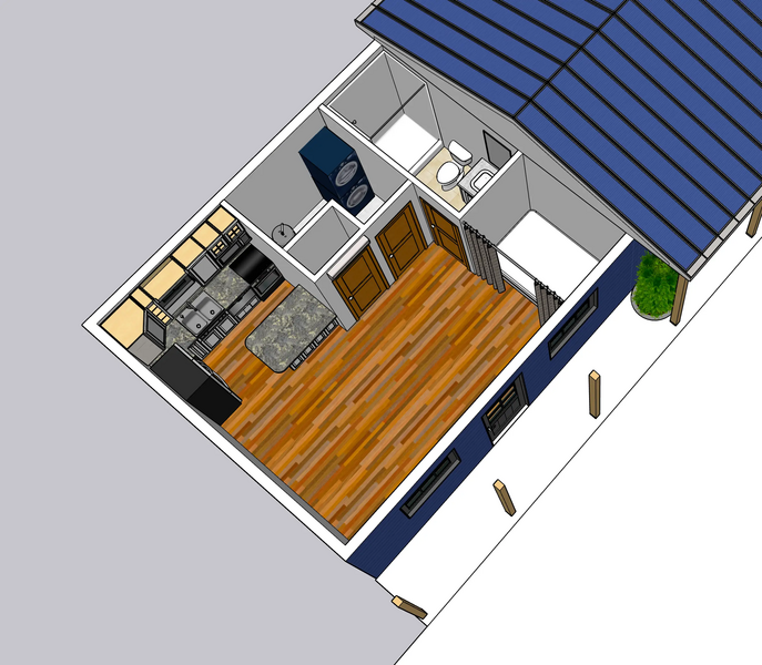 File:Post-frame affordable housing studio with garage 03.webp