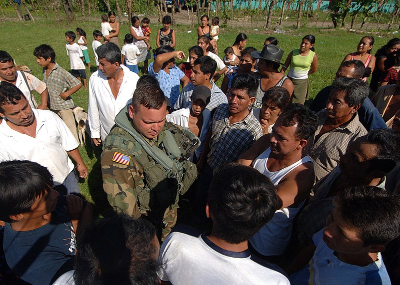 File:US Navy 051016-N-5526M-010 U.S. Army Sgt. Oscar Vega, assigned to the 1st 128th United States Air Ambulance Detachment, discusses medical issues with locals from a small village in Guatemala.jpg