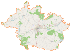 Mapa konturowa powiatu gnieźnieńskiego, na dole znajduje się punkt z opisem „Cmentarz żydowski w Czerniejewie”