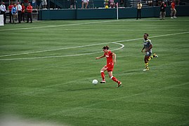 Christine Sinclair and Kia McNeill.jpg