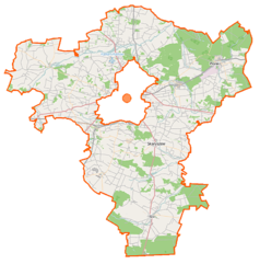 Mapa konturowa powiatu radomskiego, u góry po prawej znajduje się punkt z opisem „Pronit”