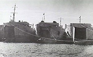 HMAS LST 3022 (at left) in 1946