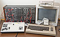 Roland modular analog synthesizer SYSTEM-100M played by a sequencer CMU-800R by AMDEK/Roland controlled by a C64 computer from the late 1970th