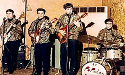 Velvet Crest, from left, Dave Bartos (vocals/bass), Joel Gordon (vocals/rhythm guitar), Terry St. George (vocals/lead guitar), Jeff Kerekes (vocals/drums), perform at a concert under their original name, By Popular Demand, c. 1968