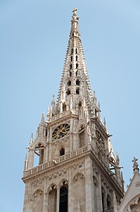 The northern bell tower with re-gilded cross