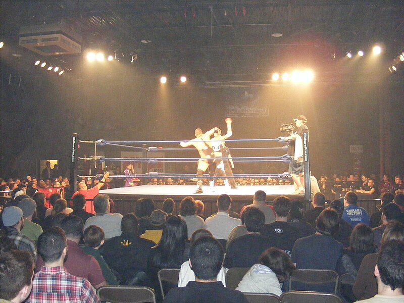 File:Colt Cabana wrestling Archibald Peck at Asylum Arena.jpg