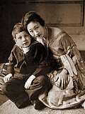 Madame Wellington Koo with her son in 1920